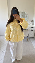 Haut jaune à petit point blanc