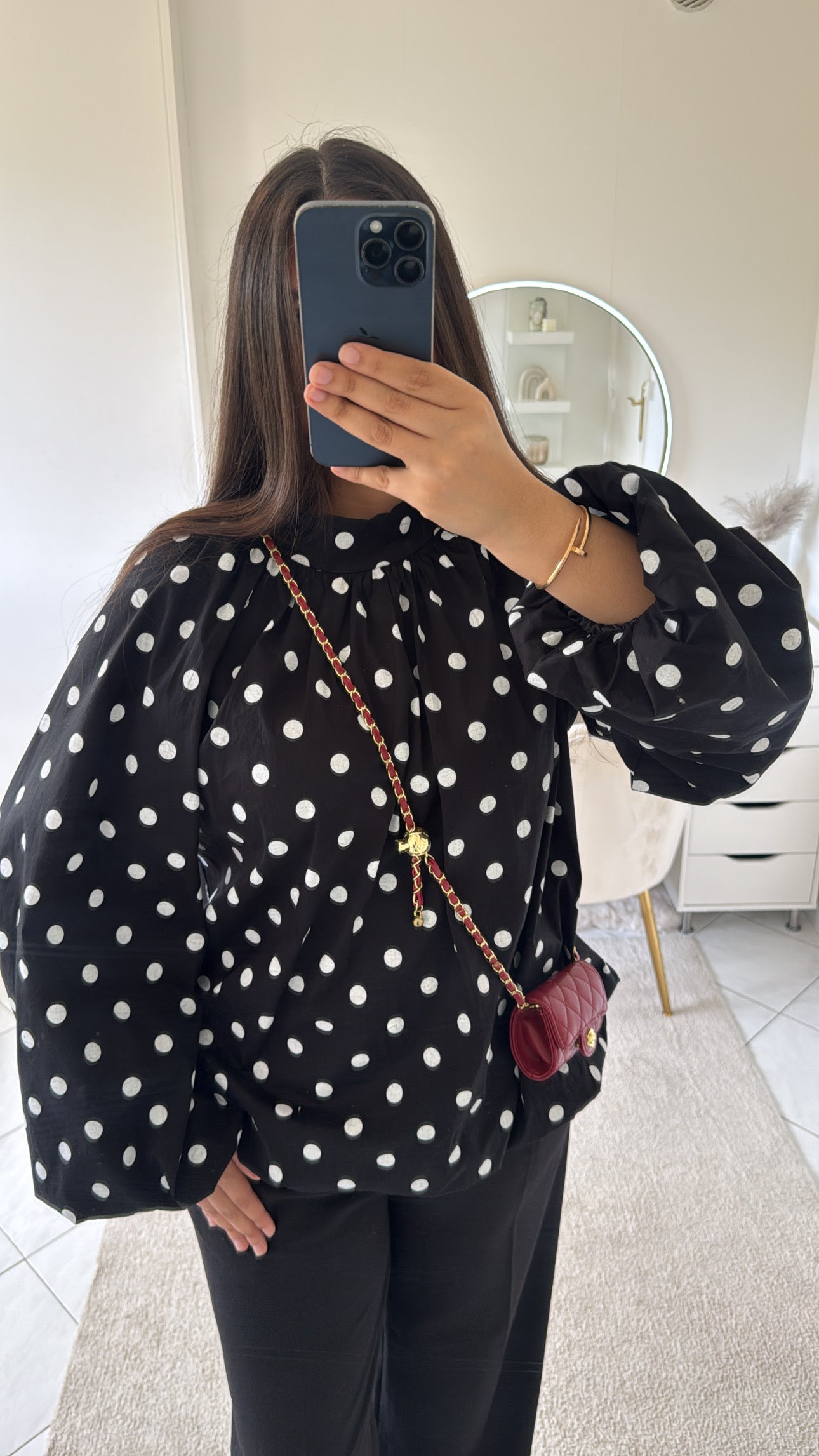 Haut noir à petit point blanc