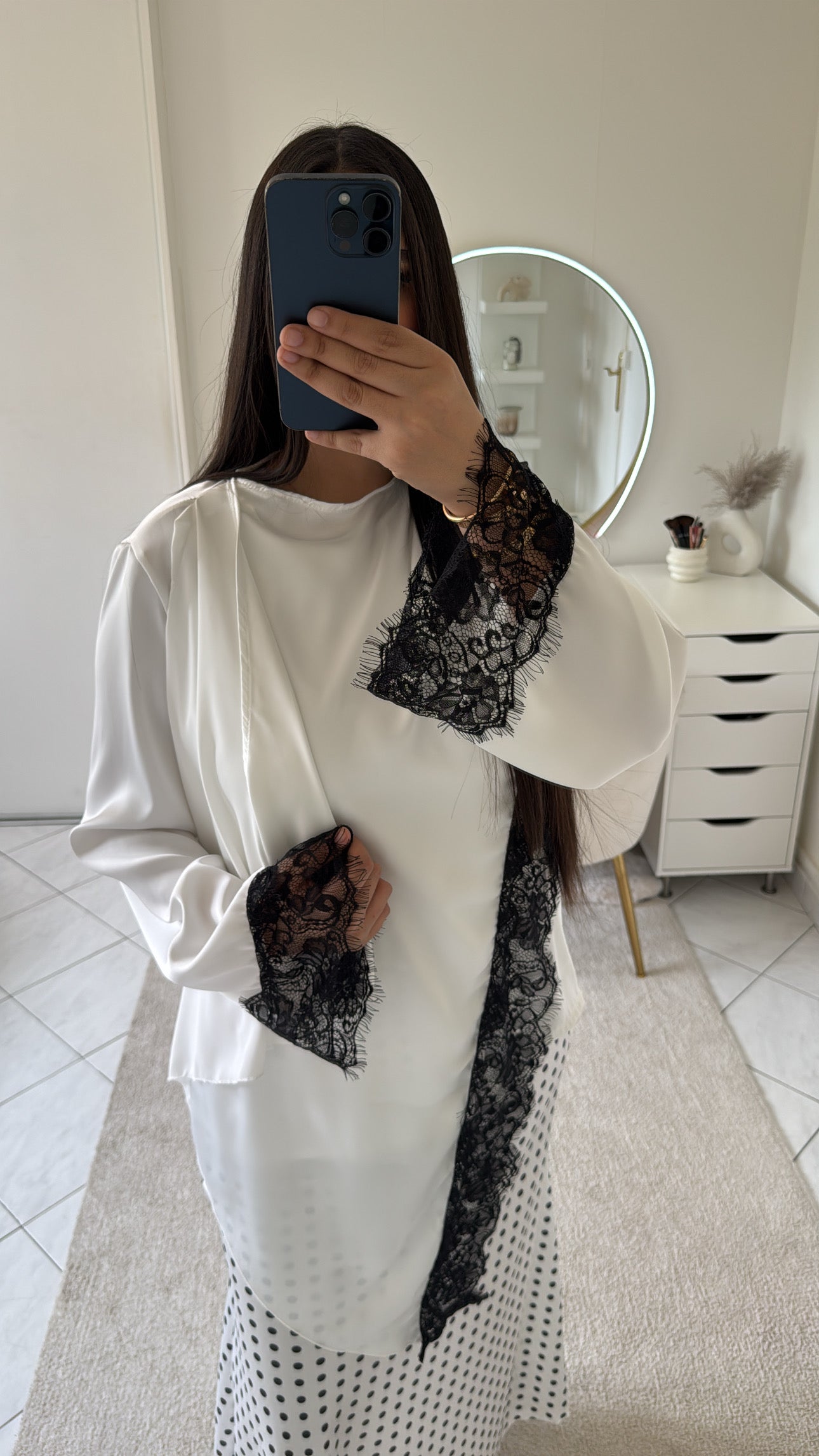 Haut à dentelle blanc et noir